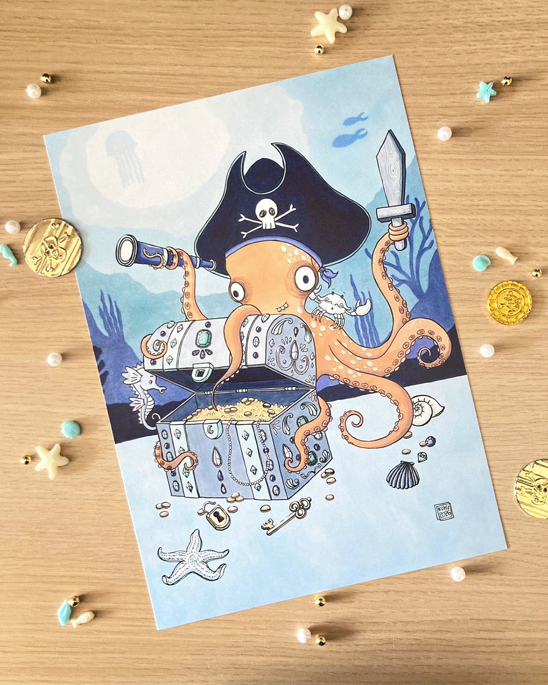 illustration d'un poulpe pirate avec son trésor rempli de pièce d'or et ses amis crabe et hippocampe